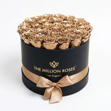 Supreme Black Box showing 24K gold preserved roses arranged in a black box
