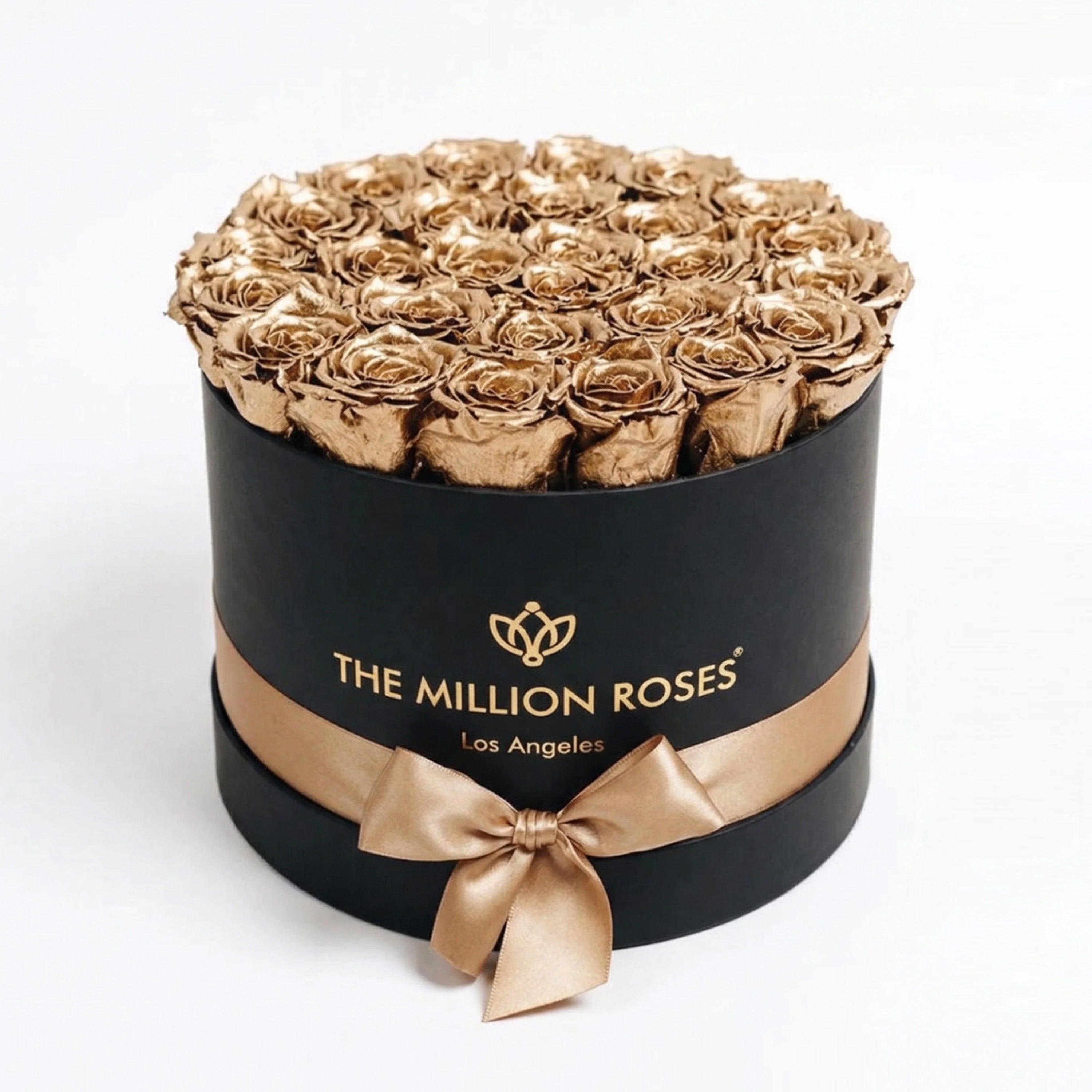 Supreme Black Box showing 24K gold preserved roses arranged in a black box