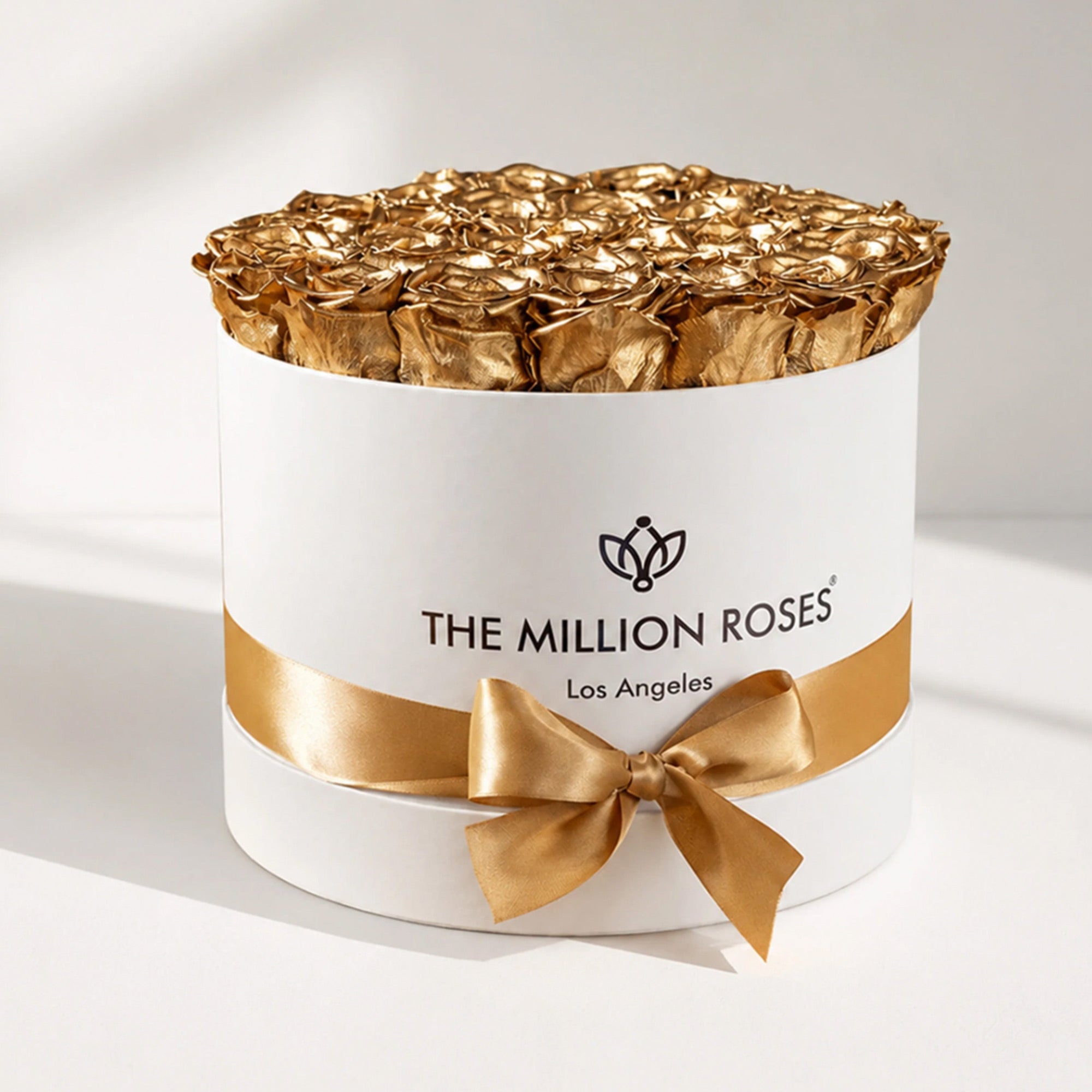 Supreme White Box containing 26-28 gold preserved roses in a white box
