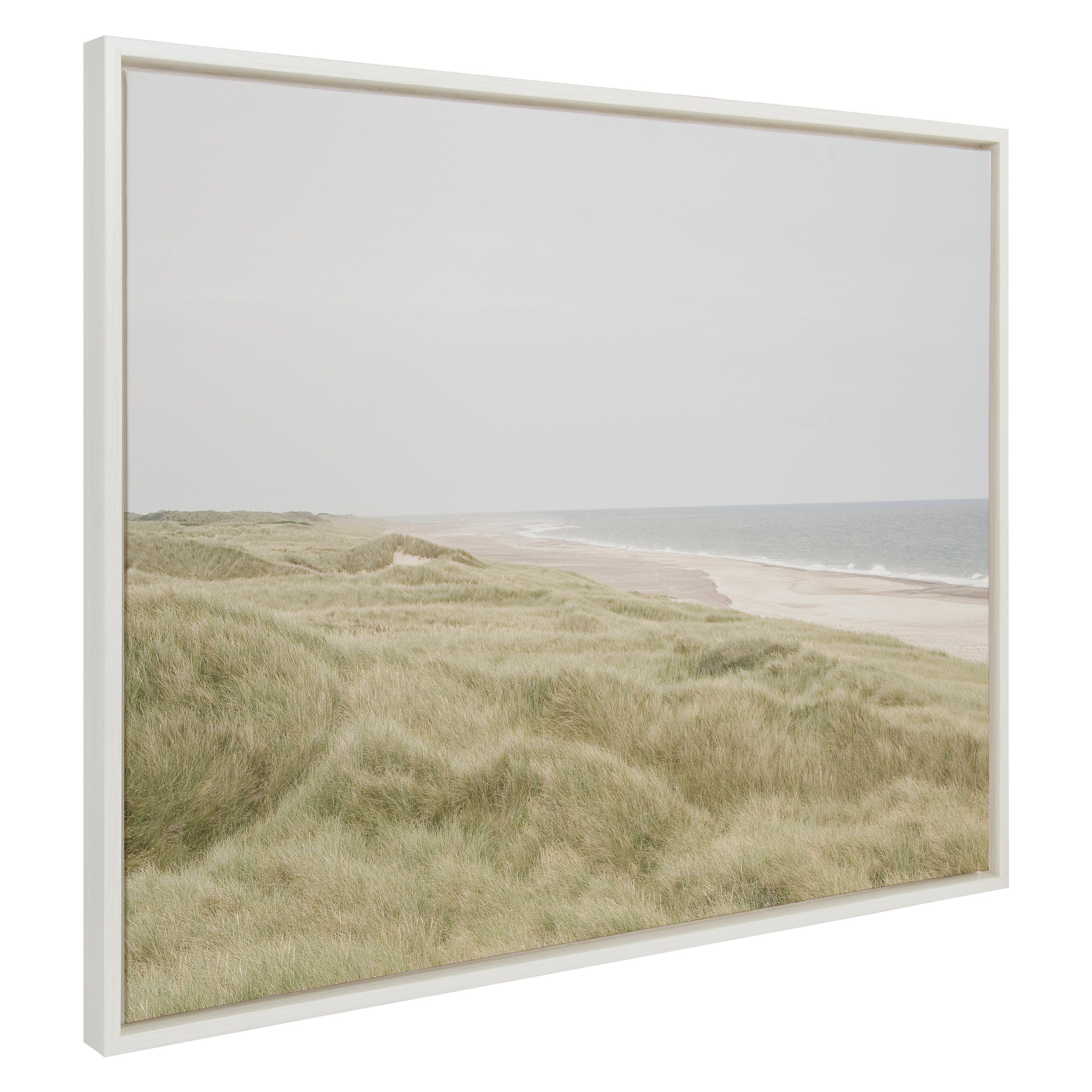 Sylvie Peaceful and Serene Coastal Landscape Framed Canvas showing a muted coastal scene with calming blue, beige, and gray tones framed in white