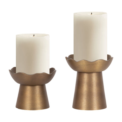 Gold Alessia Metal Pillar Candle Holder Set with scalloped edges on a white surface