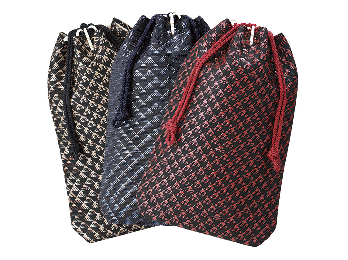 Three drawstring pouches with checkered diamond patterns in black and beige, navy blue and light blue, and black and red, arranged side by side on white background.