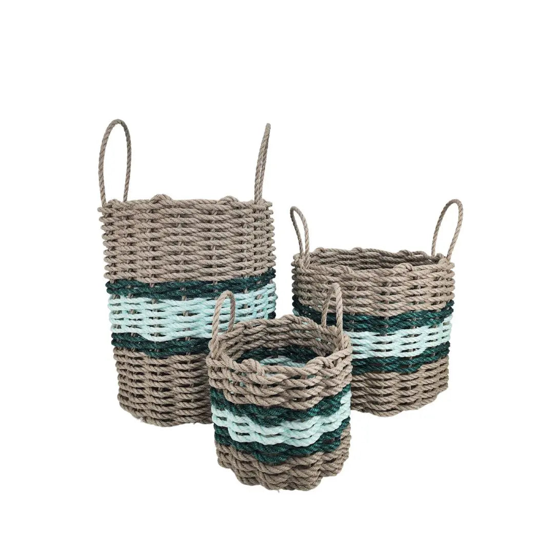 Lobster rope basket in tan and seafoam colors with hunter green accents, shown in various sizes