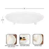 White sand-cast textured metal tray with deckled edge and satin finish, standing on short legs, shown empty and with food and books in detail views.