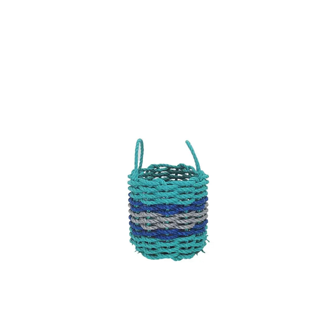 Handwoven storage basket made from Maine lobster rope in teal, light gray, and blue accents