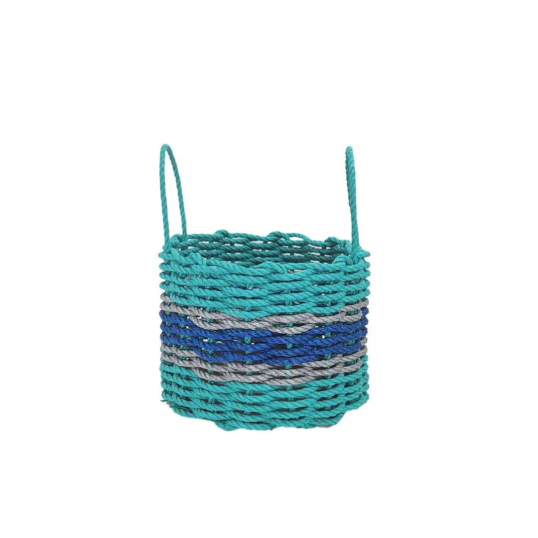 Handmade storage basket woven from teal and blue Maine lobster rope with light gray accents