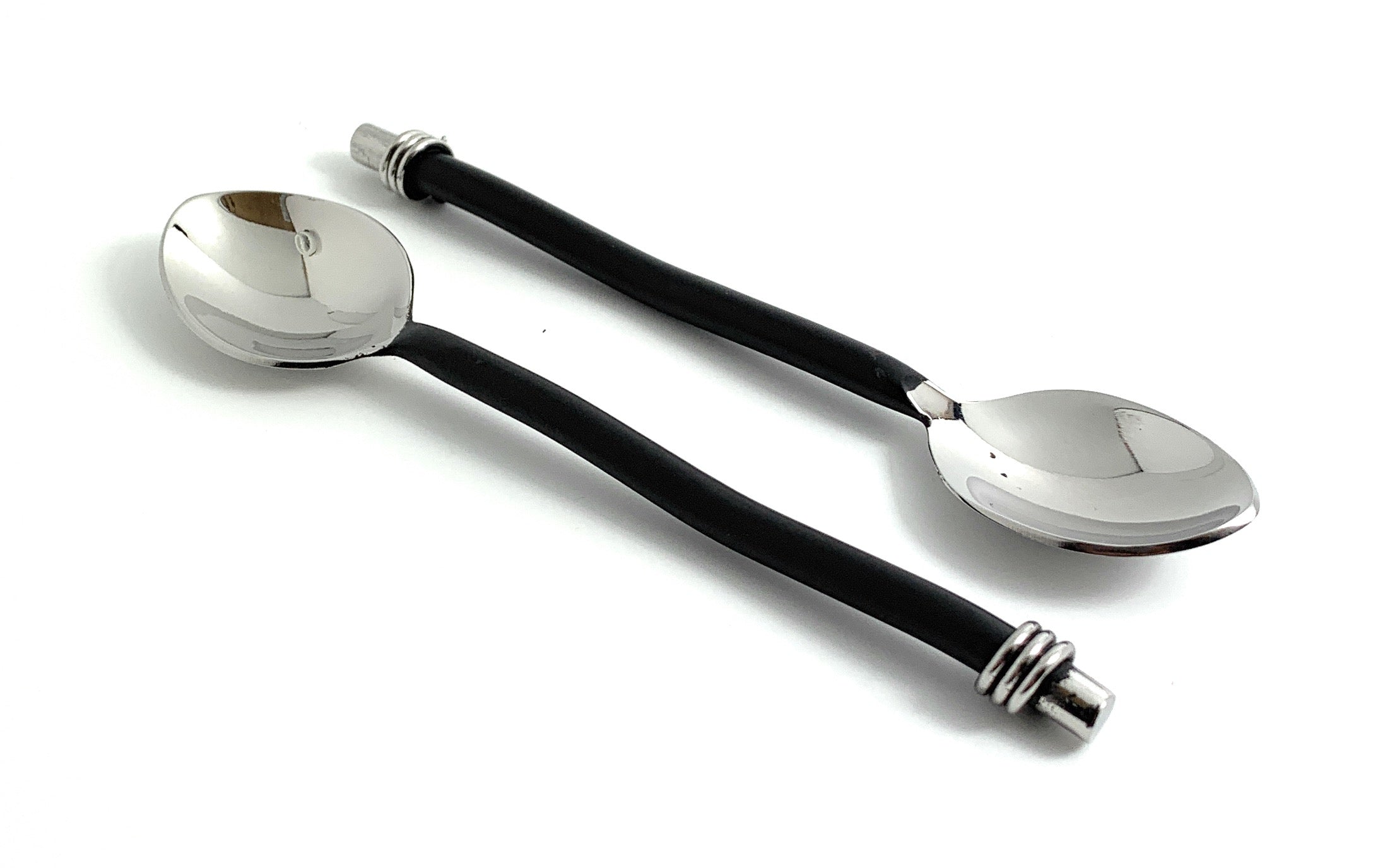 Set of six Vibhsa Black Silverware Teaspoons with twisted handles displayed on a white surface
