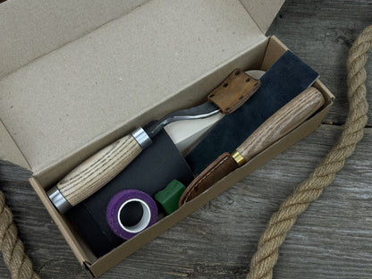 The Perfect Spoon Carving Kit for Beginners with tools, wooden blank, sandpaper, and sharpening board