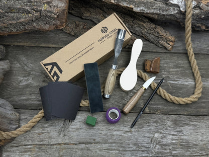 The Ultimate Beginner’s Spoon Carving Kit with tools, wooden blank, sandpaper, and sharpening board