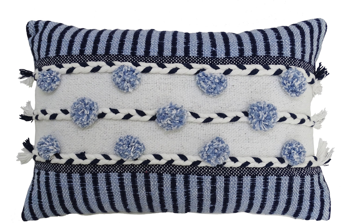 Striped throw pillow in blue and white with braided detail and tasseled fringe on sofa