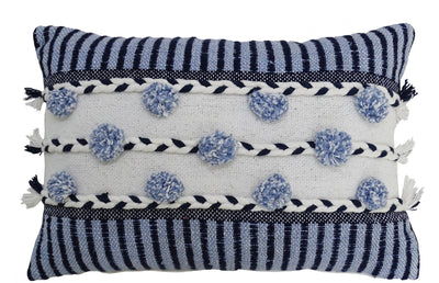 Striped throw pillow in blue and white with braided detail and tasseled fringe on sofa
