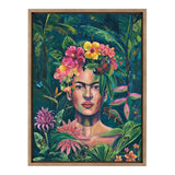 Framed canvas portrait of a woman with a floral crown and butterfly, surrounded by lush green tropical foliage and vibrant flowers on a dark background.