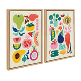 Two framed canvas prints featuring colorful, stylized fruit and vegetable illustrations with bold shapes and playful patterns on a cream background.