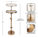Two-tier round metal table and plant stand in polished brass finish with adjustable height from 22 to 29.75 inches and locking mechanism on the central pole.