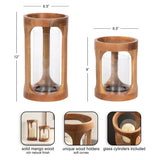 Two cylindrical mango wood candle holders with smooth curved cutouts and included glass cylinders, shown in 12- and 9-inch heights with 6.5-inch diameters