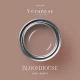 BLOOMHOUSE paint cans and sample swatches in soft mauve tones
