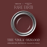 The ‘Viola’ Oxblood interior paint cans and examples of painted spaces in red hues