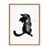 Black and gray watercolor painting of a playful cat stretching upward on white background, framed in light wood.
