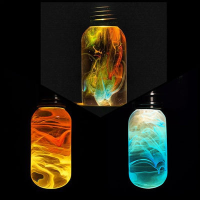 Three handcrafted resin LED bulbs with unique color patterns, shown in a 3-pack