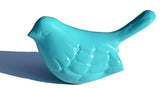 Turquoise aluminum bird figurine from Vibhsa displayed on tabletop
