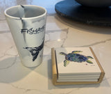 Sea Turtle Coaster set with detailed sea turtle design on a wood caddy holder, styled on a coastal-themed table