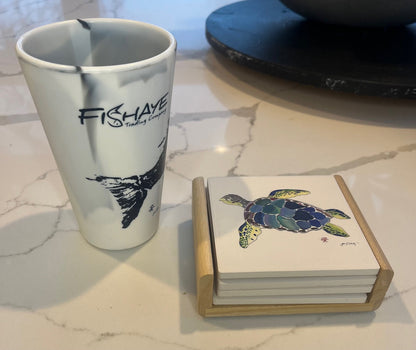 Sea Turtle Coaster set with detailed sea turtle design on a wood caddy holder, styled on a coastal-themed table