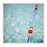 Red and white floating buoys attached to a twisted blue and white rope in clear, rippling pool water, framed with a thin white frame.