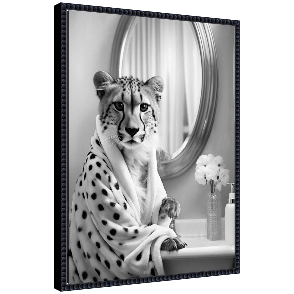 Black and white photo of a cheetah wearing a spotted robe, seated at a vanity with a round mirror and a vase of flowers in the background.