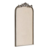 Tall beige fabric pinboard with a silver curved frame and ornate rococo floral detailing at the top center, shown against a white background.