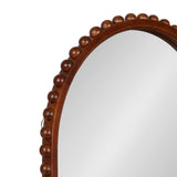 Arched wall mirror with a smooth brown wooden frame accented by evenly spaced spherical beads along the outer edge, reflecting a plain background.