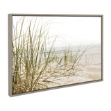 Framed canvas print of tall beach grass on sandy dunes with a soft, muted seascape in the background under light sky.