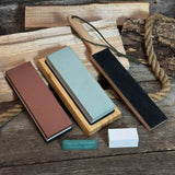 Universal Sharpening Kit including sharpening stones, leather strop, polishing compound, and wooden stand
