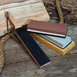 Universal Sharpening Kit including sharpening stones, leather strop, polishing compound, and wooden stand
