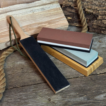 Universal Sharpening Kit including sharpening stones, leather strop, polishing compound, and wooden stand