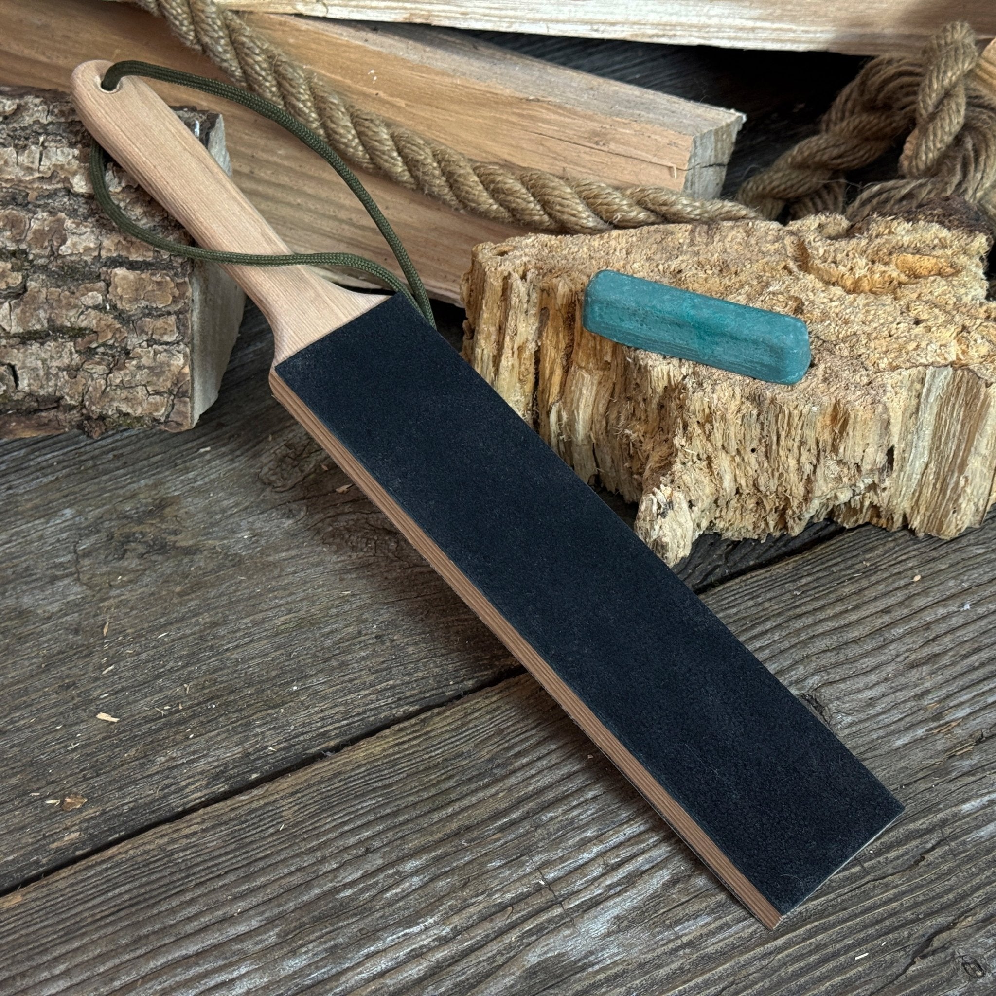 Universal Sharpening Kit including sharpening stones, leather strop, polishing compound, and wooden stand