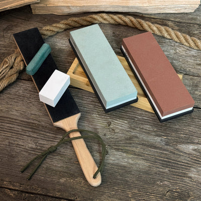 Universal Sharpening Kit including sharpening stones, leather strop, polishing compound, and wooden stand