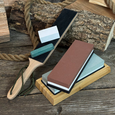 Universal Sharpening Kit including sharpening stones, leather strop, polishing compound, and wooden stand