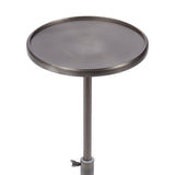 Round polished metal table top with a raised edge supported by a single central tubular leg and adjustable clamp near the base.