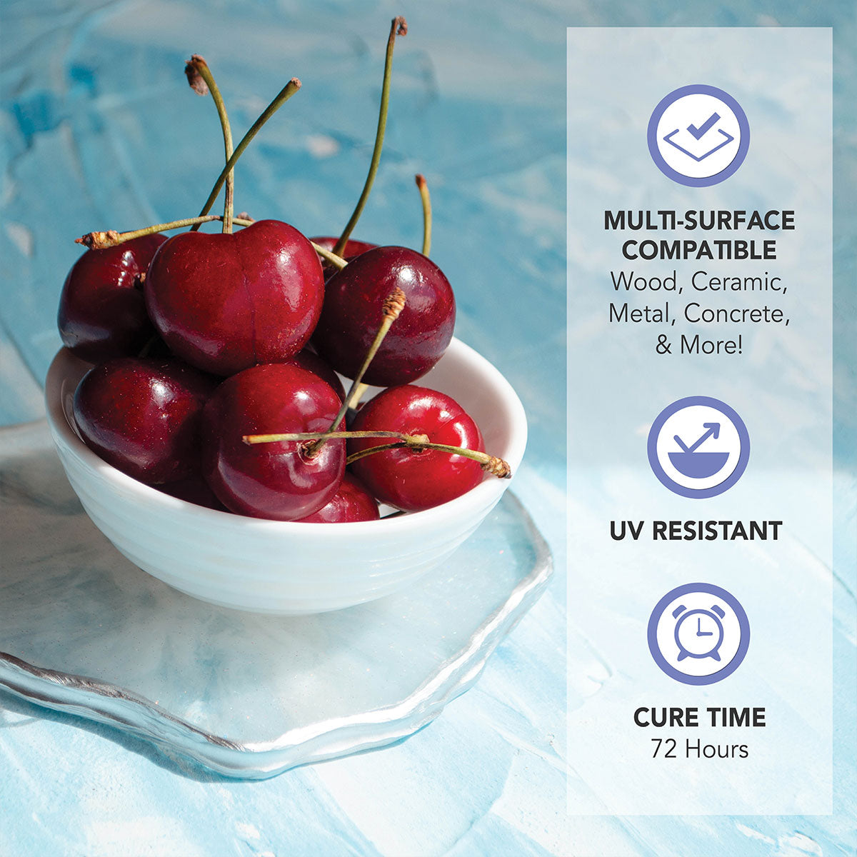 White bowl filled with dark red cherries on a light blue-grey textured surface, next to text highlighting multi-surface compatibility, UV resistance, and 72-hour cure time.
