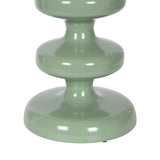 Close-up of Fondi Metal Side Table's pale green glossy pedestal base with three bulbous rounded sections stacked vertically.