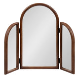 Tri-fold mirror with three arched panels framed in smooth dark wood, featuring a large central mirror and two smaller hinged side mirrors that fold inward.