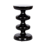 Glossy black metal side table with four connected rounded, bulbous shapes forming the base and a smooth circular top.