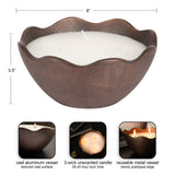 Brown cast aluminum scalloped bowl candle with a textured surface, featuring three white wicks and measuring about 8 inches wide by 3.5 inches tall.