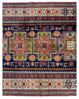 Vintage Armenian Karabakh rug with large geometric star motifs in red, yellow, green, and white on a navy blue field, bordered by repeating intricate floral and abstract patterns.