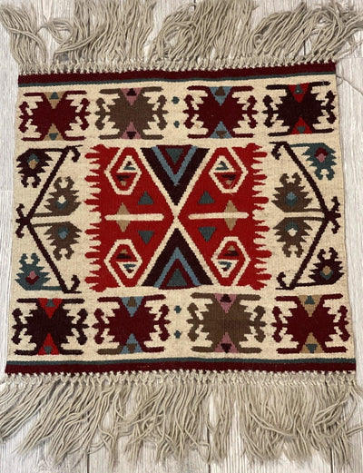 Vintage Navajo Like Bulgarian Wool Kilim Display Rug laid on wooden floor