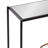 Close-up of a Catriona side table corner featuring a rectangular mirrored top with a black metal frame and slender cylindrical legs.