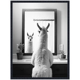 Black and white photo of a fluffy llama seen from behind facing a bathroom mirror, with two potted plants on the sink countertop and a towel rod in the background.