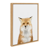 Framed canvas print of a red fox with half-closed eyes and fluffy fur, centered on a plain white background with a light wooden frame.