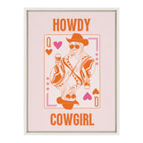 Framed pink canvas print featuring a stylized playing card with a mirrored cowgirl in shades of orange, holding a wine glass, with 'Howdy Cowgirl' text in bold orange.