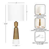 Table lamp with a soft white linen shade and a tapered hourglass base of white marble and polished brass, standing 19.75 inches tall with a clear cord and toggle switch.